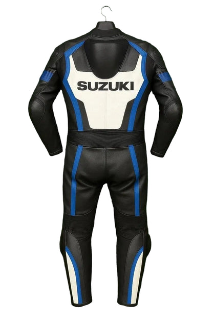 Detailed view of the Suzuki chest wordmark, royal blue accents, and perforated leather panels on a track suit.