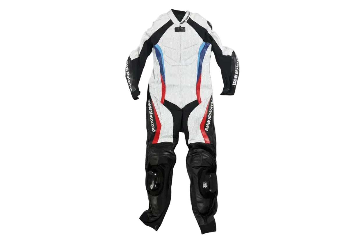 BMW Motorrad one-piece leather racing suit in white and black with M-sport tri-color livery.