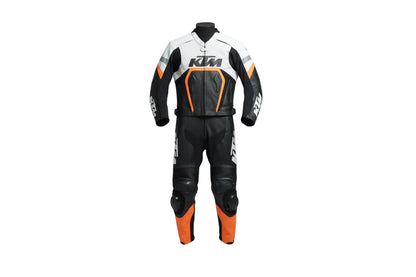 KTM professional two-piece leather racing suit in orange, white, and black with perforated chest panels.