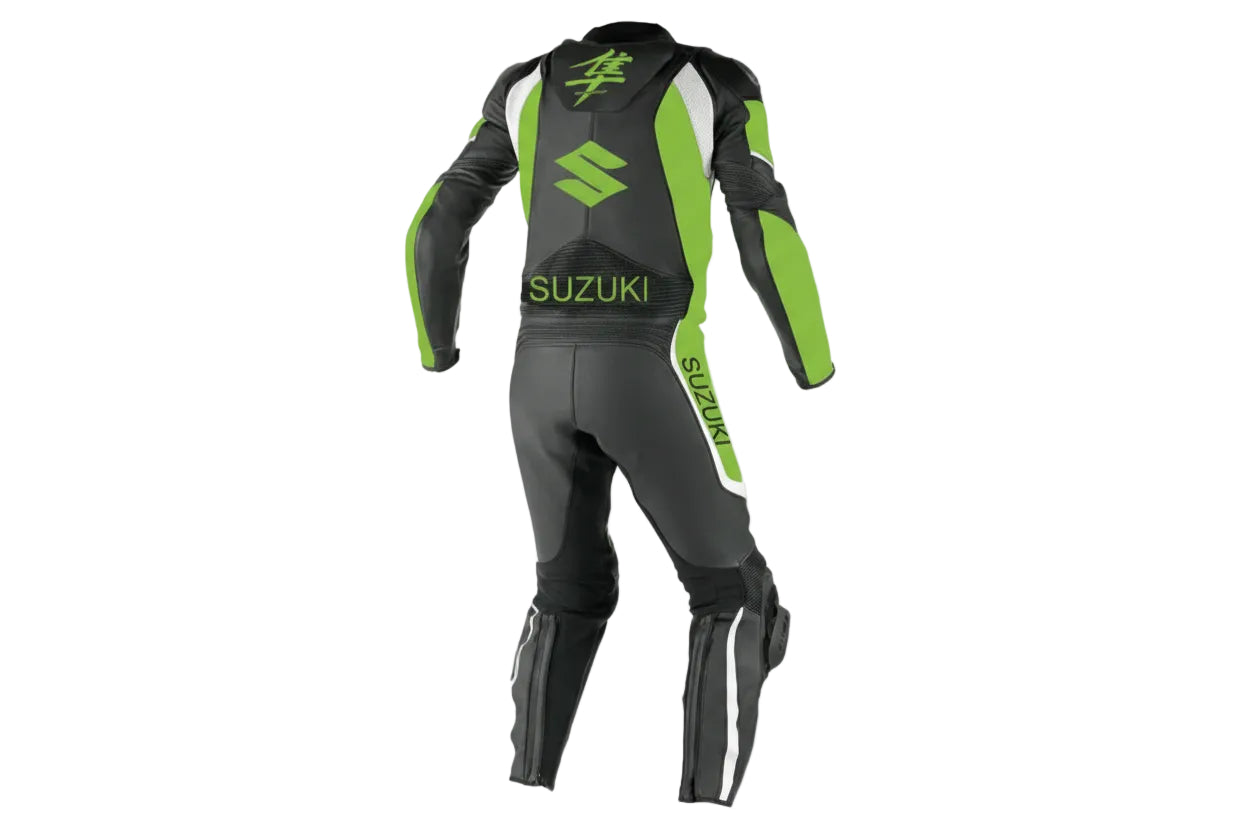 Detailed view of the kinetic green Hayabusa kanji chest logo, technical padding, and black knee sliders on a track suit.