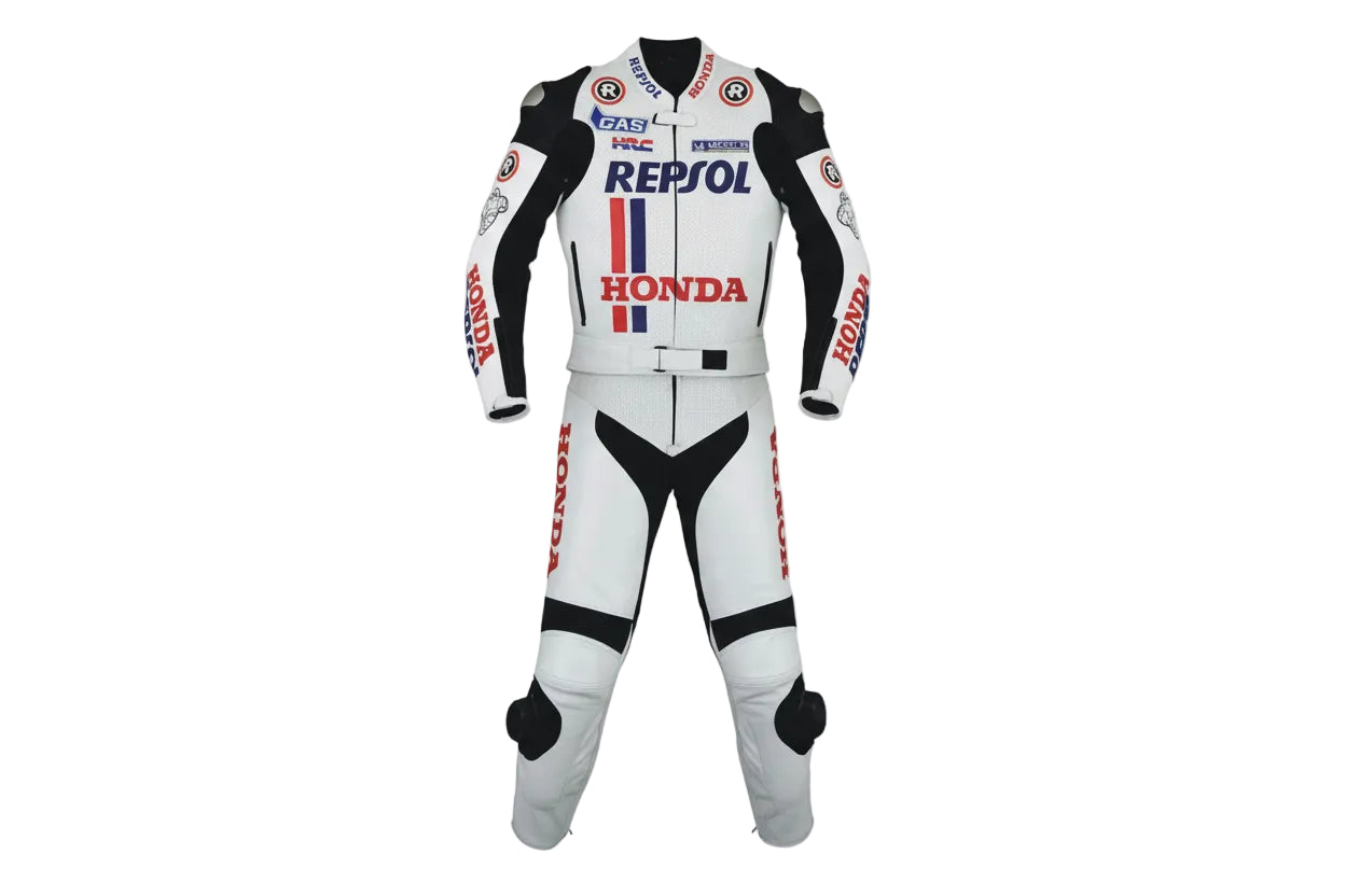 Repsol Honda two-piece leather racing suit in white, red, and blue with MotoGP sponsor livery.