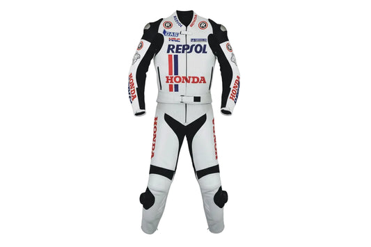 Repsol Honda two-piece leather racing suit in white, red, and blue with MotoGP sponsor livery.