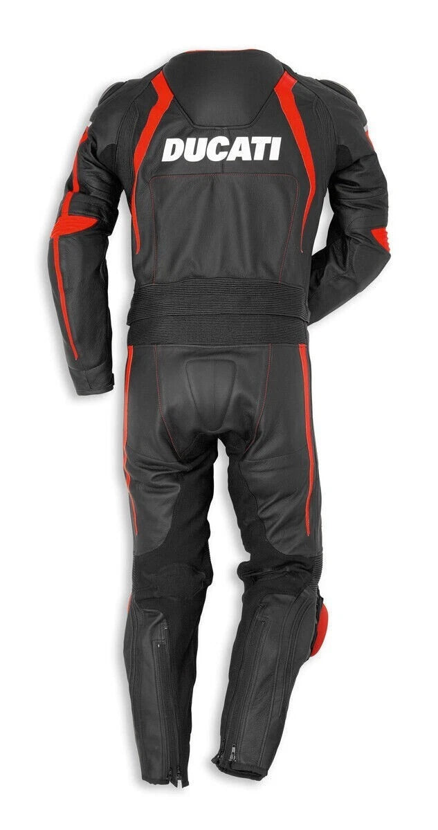Detailed view of the Ducati Corse chest shield, red technical outlines, and professional red knee sliders on a black leather track suit.