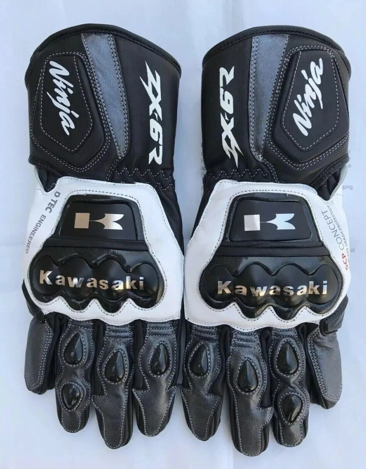 Kawasaki Ninja ZX-6R leather motorcycle racing gloves in black, white, and grey with articulated armor.