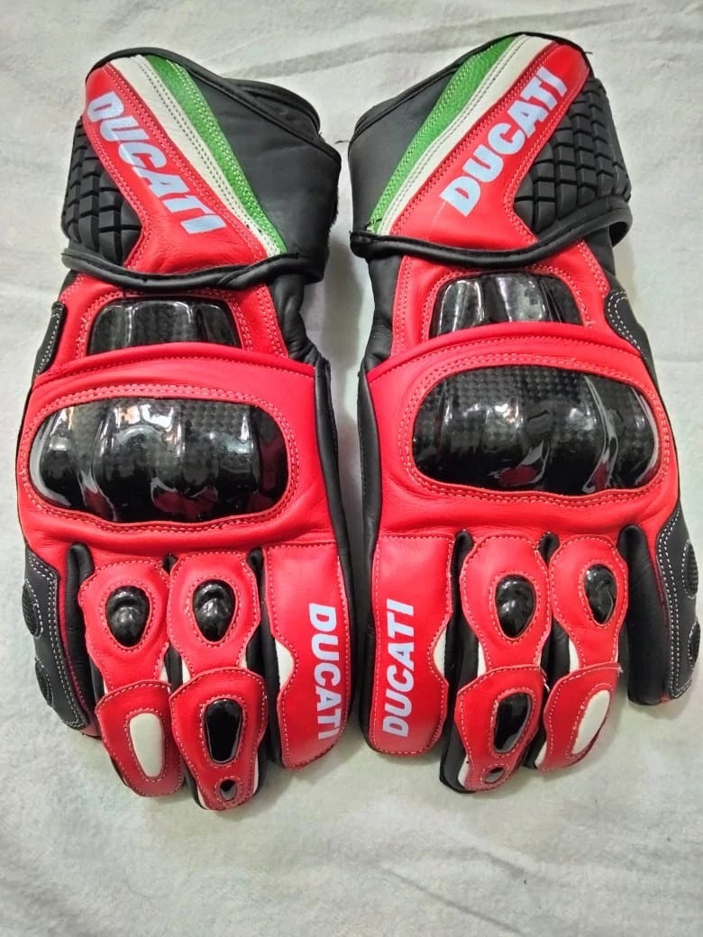 Ducati leather motorcycle racing gloves in red and black with carbon fiber knuckle armor.