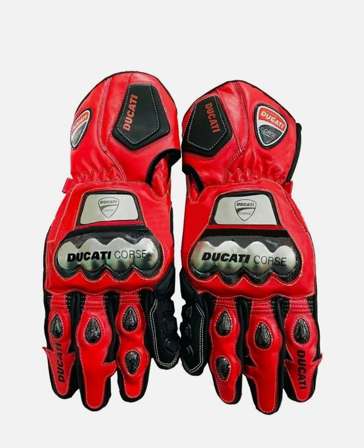 Ducati Corse leather motorcycle racing gloves in red with metallic knuckle armor and carbon fiber finger sliders.