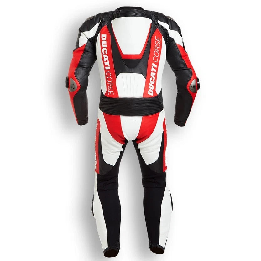 Detailed view of the Ducati chest branding, D-air logo, and professional metallic shoulder sliders on a tri-color track suit.