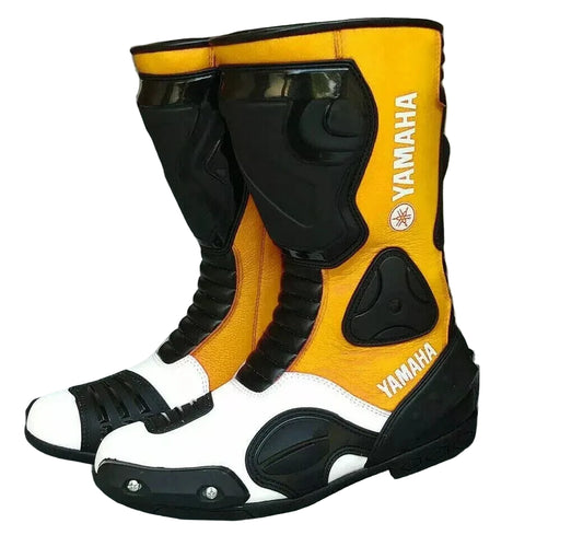 Yamaha Factory Racing leather motorcycle boots in yellow, white, and black.