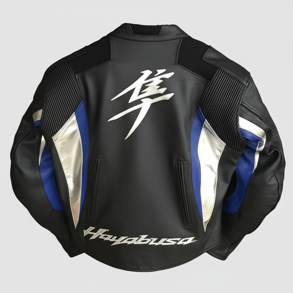Detailed view of the silver Hayabusa Kanji branding, red Suzuki shoulder logo, and cobalt blue technical panels on a black leather jacket.