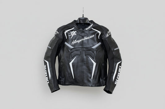 Suzuki Hayabusa black and white leather motorcycle racing jacket with Kanji logo and integrated armor.