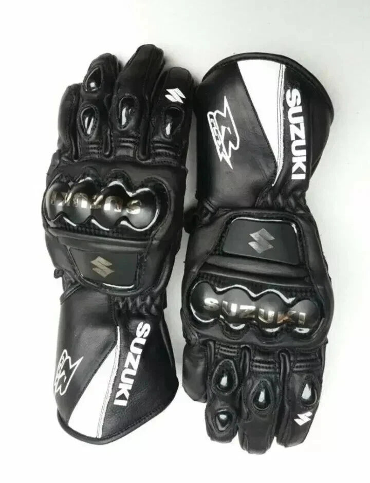Suzuki GSX-R leather motorcycle racing gloves in black and white with metallic knuckle armor.