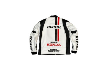 Detailed view of the Repsol and Honda chest branding, sponsor logos, and professional leather construction on a racing jacket.