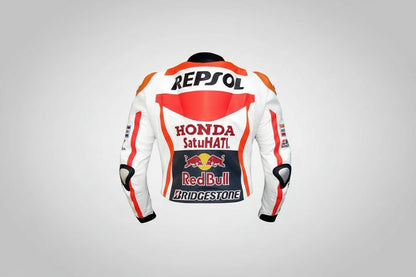 Detailed view of the Repsol chest logo, Red Bull sponsor patches, and external hard-shell shoulder sliders on a professional leather jacket.