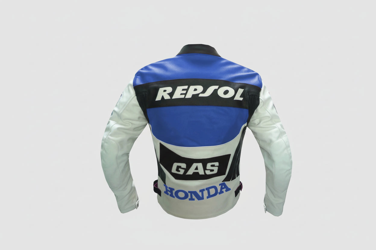 Detailed view of the Repsol chest logo, blue technical panels, and professional sponsor patches on a Honda racing jacket.