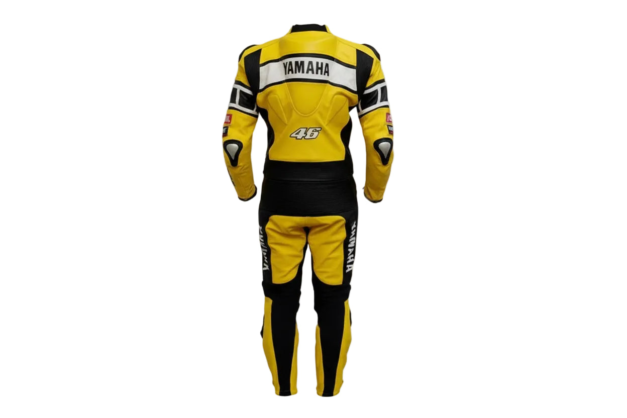 Detailed view of the Yamaha chest branding, AGV sponsor patches, and yellow accordion stretch panels on a professional racing suit.