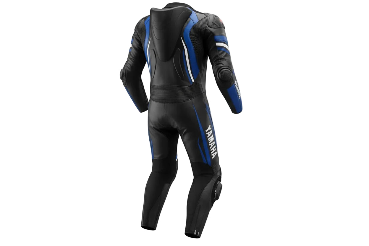 Detailed view of the Yamaha chest branding, external shoulder sliders, and blue technical graphics on a professional racing suit.