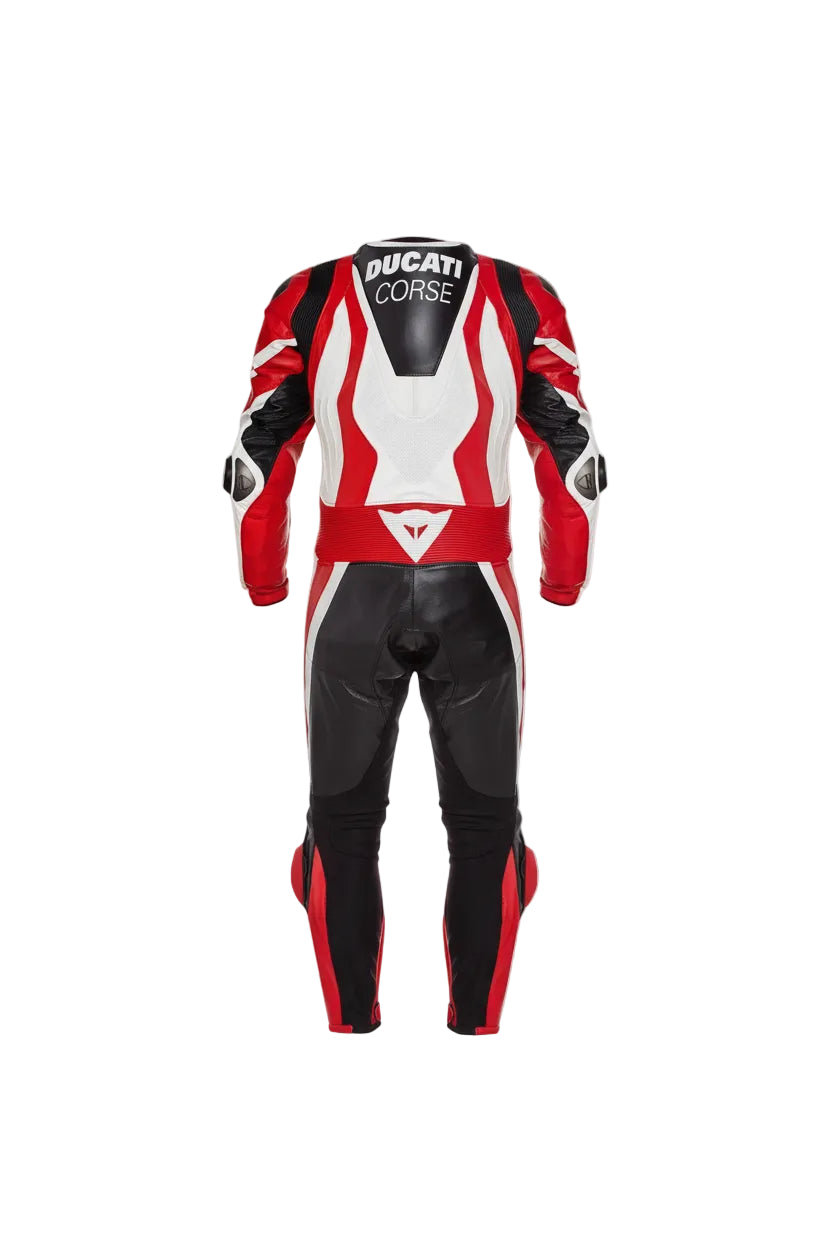 Detailed view of the Ducati Corse chest shield, perforated leather panels, and red knee sliders on a professional track suit.