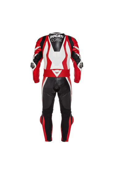 Detailed view of the Ducati Corse chest shield, perforated leather panels, and red knee sliders on a professional track suit.