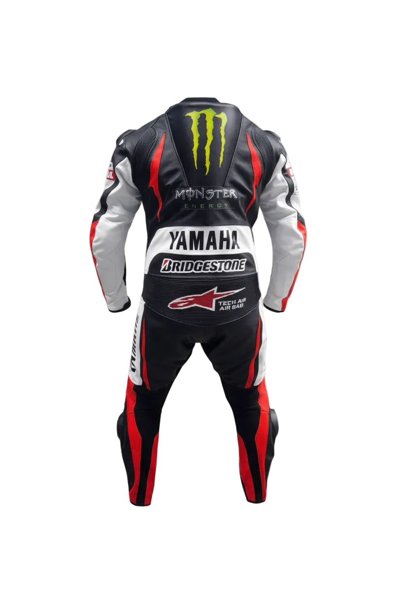 Detailed view of the Yamaha chest logo, perforated leather panels, and tricolor shoulder graphics on a professional racing suit.