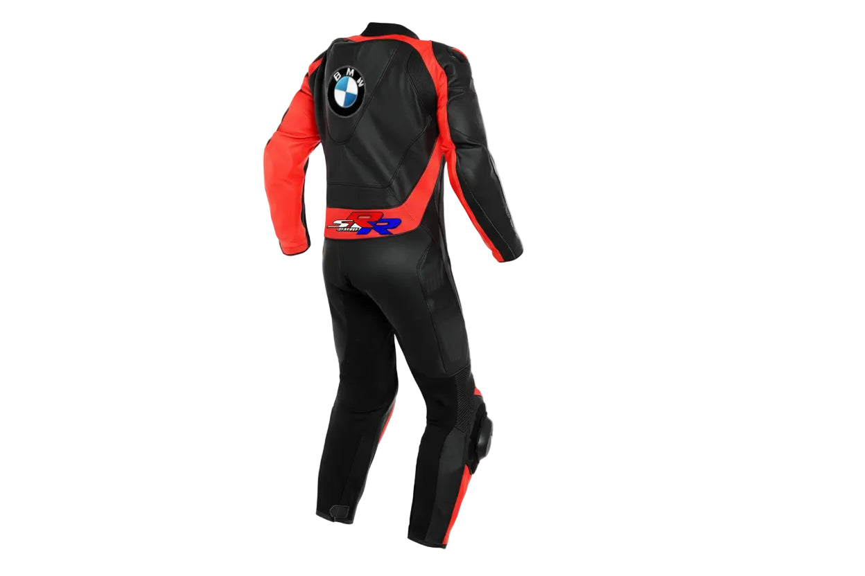 "Detailed view of the BMW M chest logo, perforated leather panels, and accordion stretch sections on a professional racing suit.