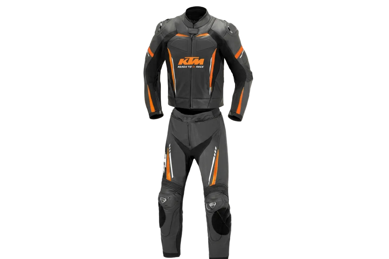 KTM Racing black and orange leather motorcycle racing suit with 'Ready to Race' branding and integrated armor.