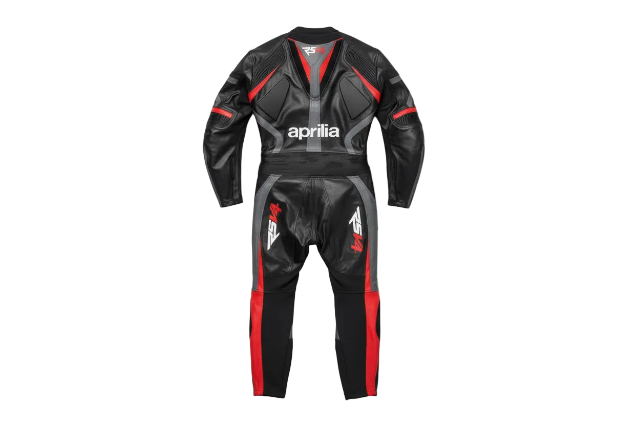 Detailed view of the red accordion stretch panels, Aprilia Racing chest logo, and SBK sponsor patch on a professional racing suit