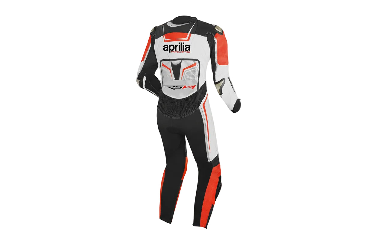 Detailed view of the orange leather accents, Aprilia Racing chest logo, and accordion stretch panels on a professional racing suit.
