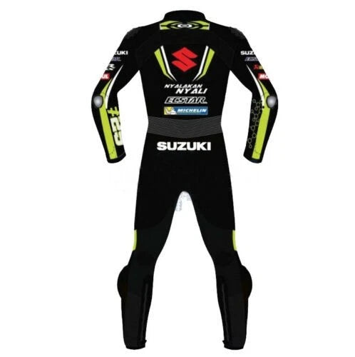 Detailed view of the Suzuki ECSTAR chest branding and neon yellow knee sliders on a professional track suit.