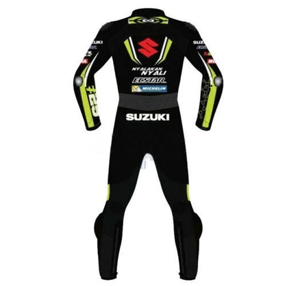 Detailed view of the Suzuki ECSTAR chest branding and neon yellow knee sliders on a professional track suit.